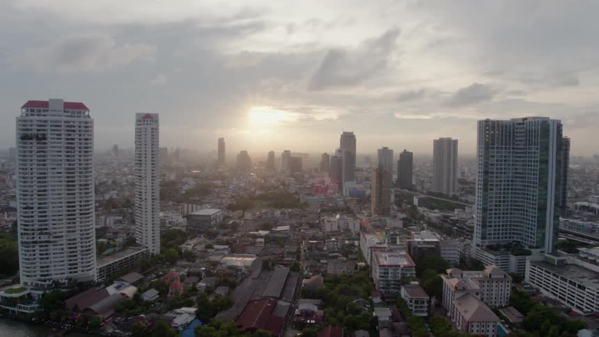 Tall city buildings tower into the sky