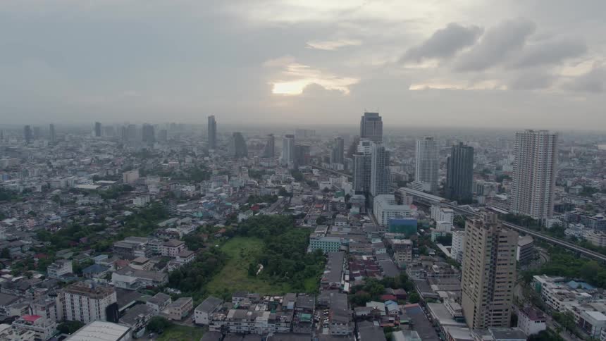Tall city buildings tower into the skyline
