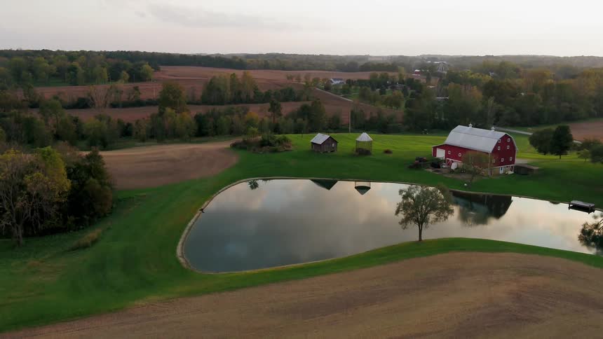 Lake in the middle of hilly farmland