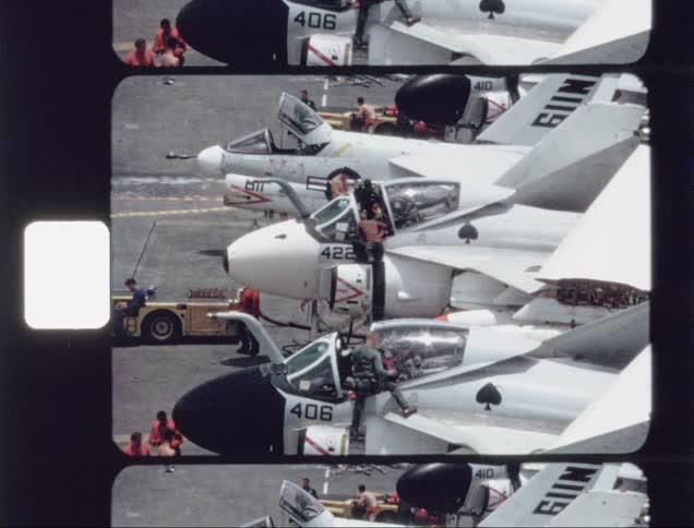Men prepare jets for flight