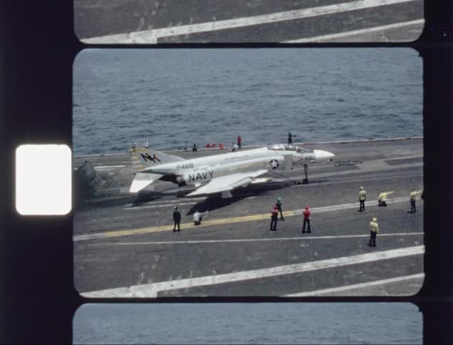 People stand by as a jet suddenly takes off