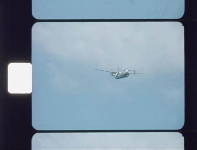 The plane flies high into the clouds