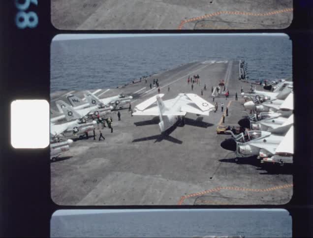 A jet is driven on an aircraft carrier