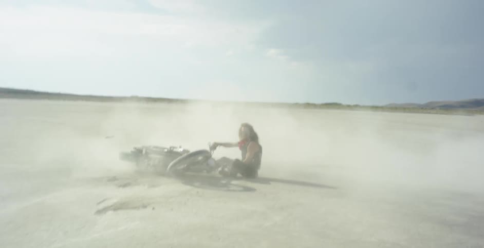 A man wipes out crashing on his motorcycle