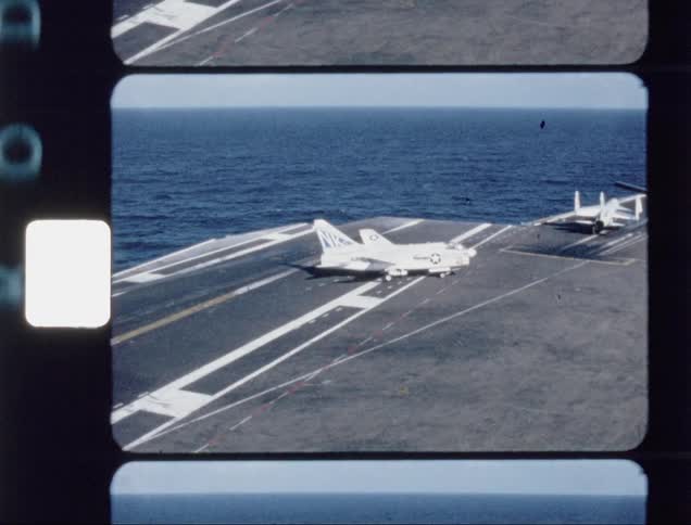 A plane is driven on an aircraft carrier