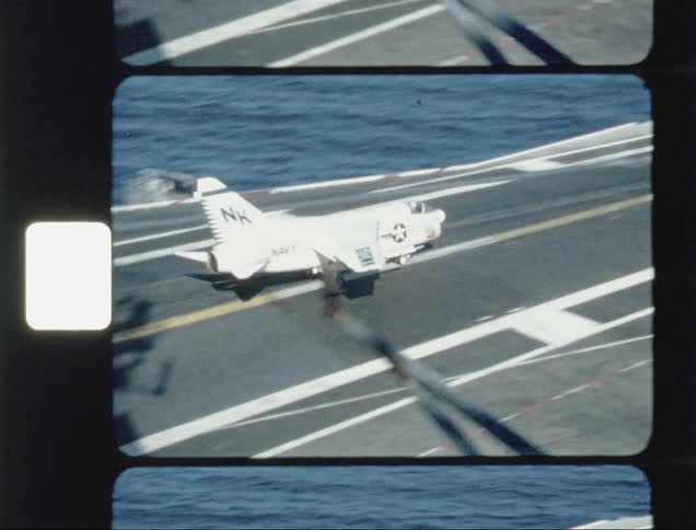 The jet lands on the hangar in the water