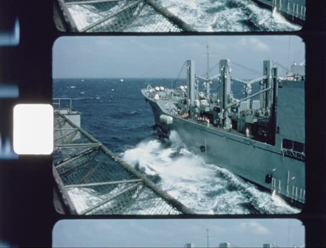 The waves crash against the side of the ship