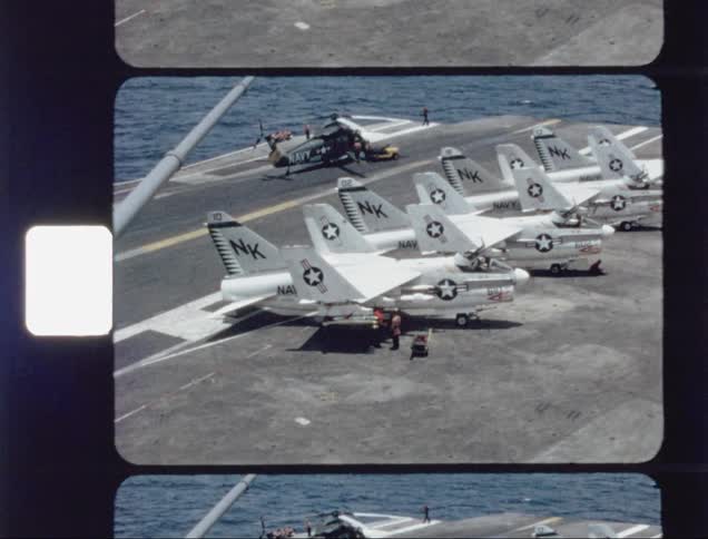 Airplanes resting on an aircraft carrier