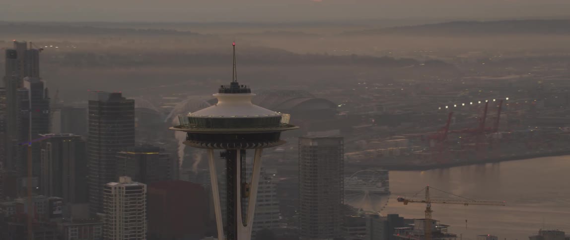 The space needle towers into the city skyline