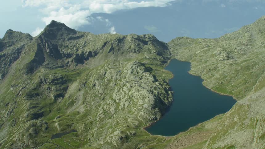 Lake in a shallow mountaintop area on a cloudy day
