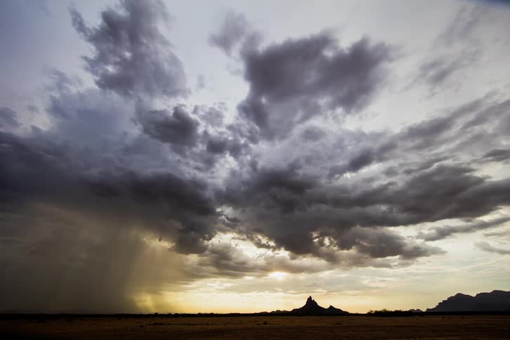 Storm clouds gather and pass in the sky