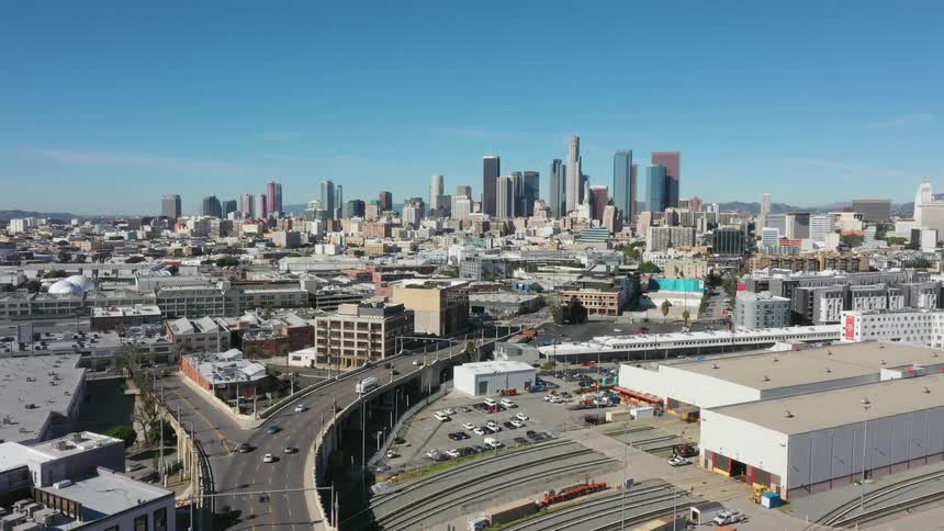 Cars drive on a city highway