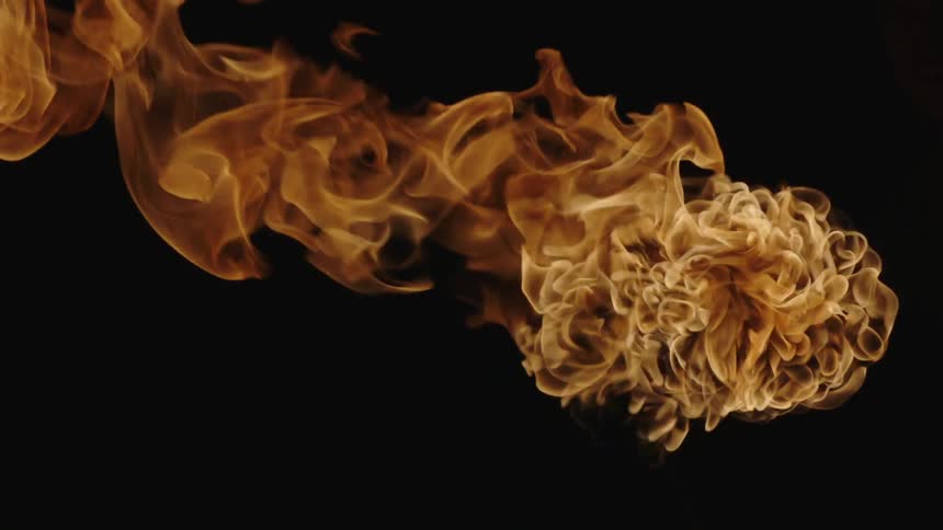 The fire rises and spreads in the dark area