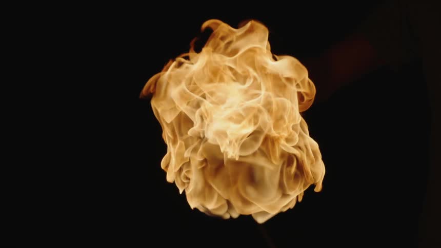 A flame ignites in the air