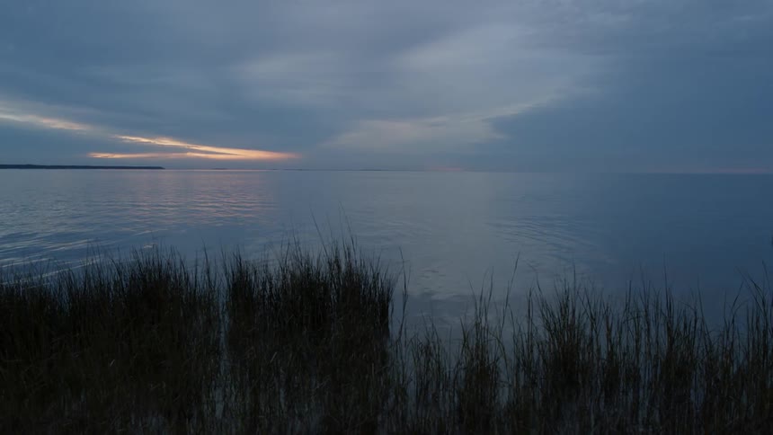 Water flows gently in a large body of water