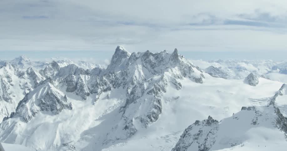 Dramatic European mountain range covered in snow and ice
