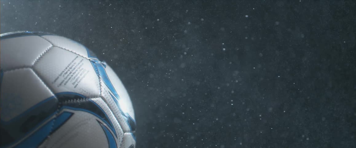 Close up view of a soccer ball spinning