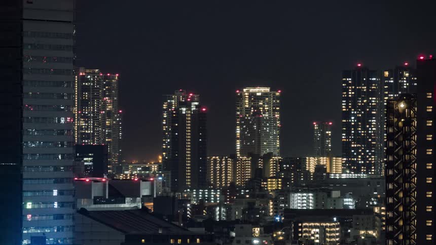 City lights illuminate the night sky