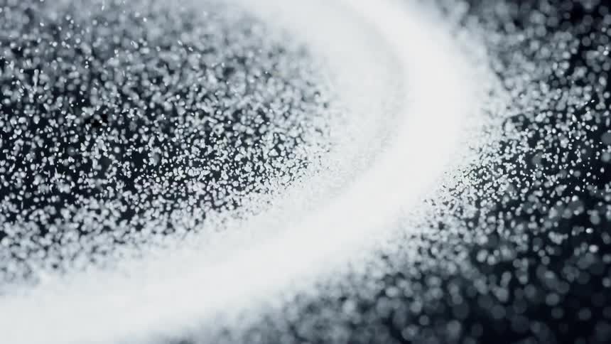 White particles vibrate wildly