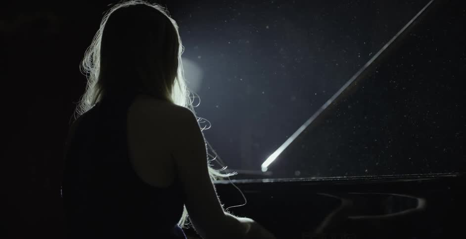 A pianist plays the piano