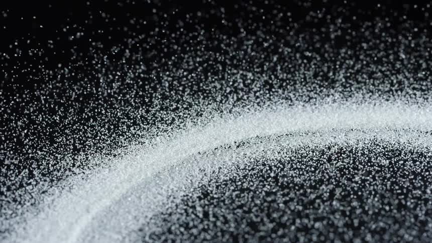 Granules are vibrating and bouncing on a surface