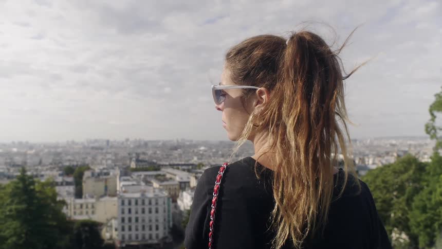 A woman's hair blows in the breeze