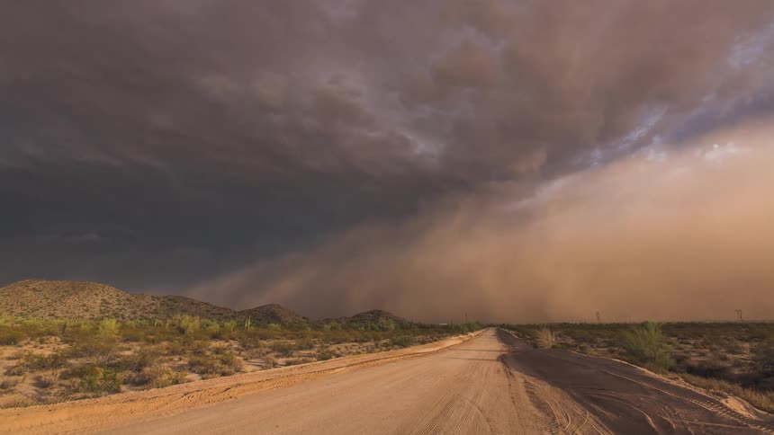 Timelapse of an approaching dust storm on a cloudy day