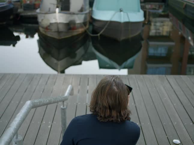 A man looks at his phone