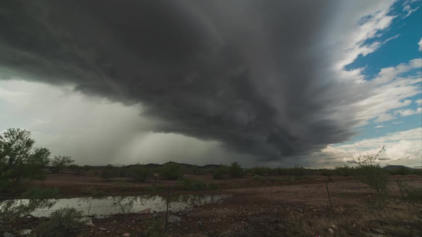 A storm is shown in timelapse in the desert