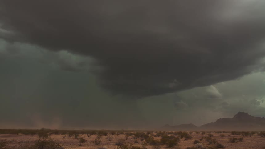 Time lapse of a field as a tornado forms