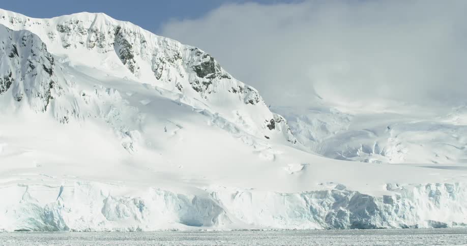 Snow and ice cover the mountains