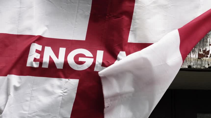 An england flag waves in the breeze