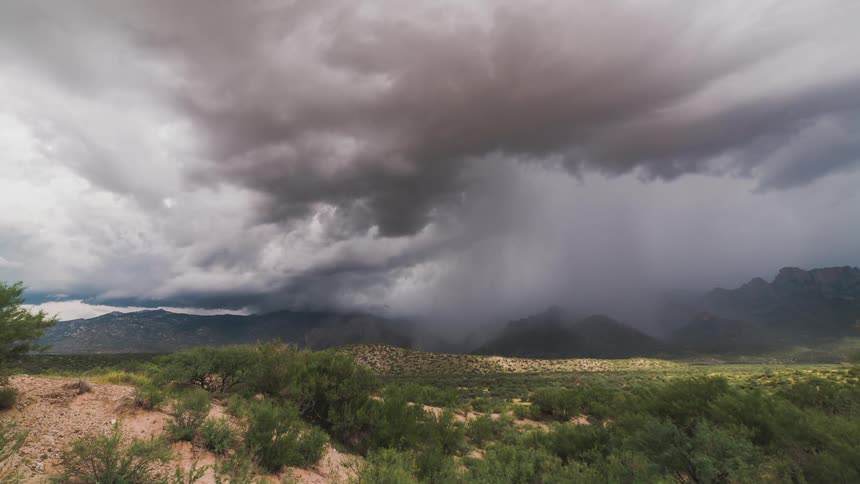Time lapse of a violent storm moving over a mountainous area