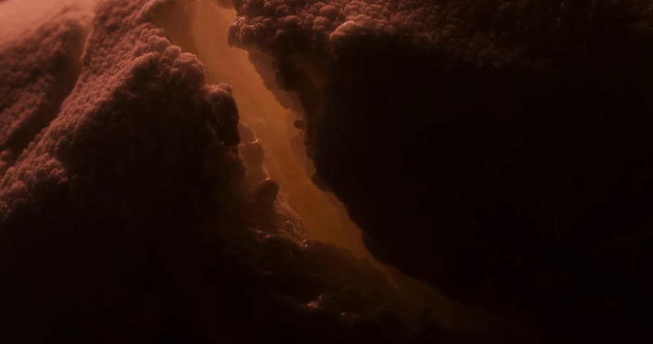 Foam grows and expands in the dark