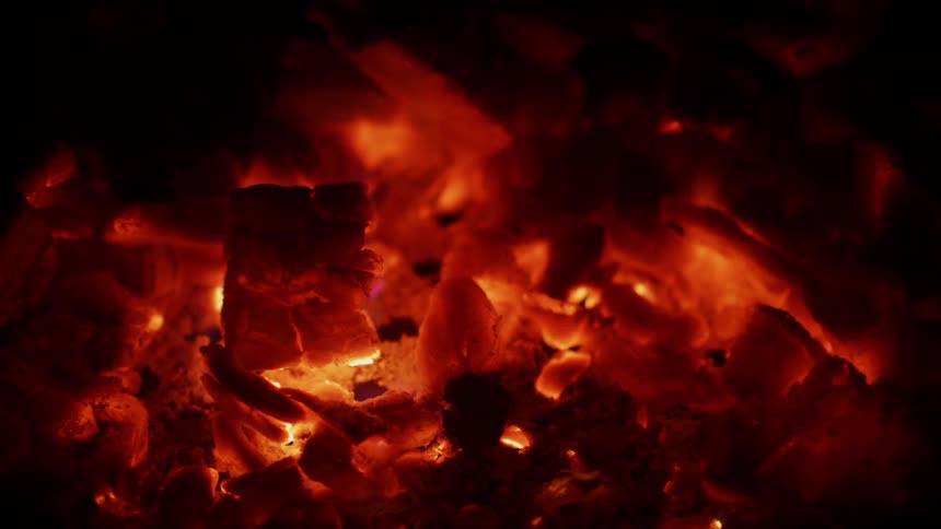 Burning embers glow in the dark