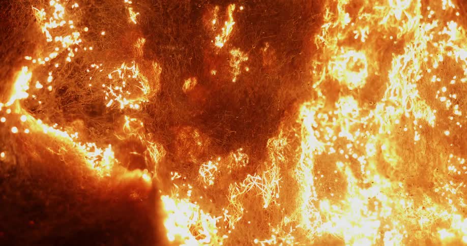 A fire burns up fibers