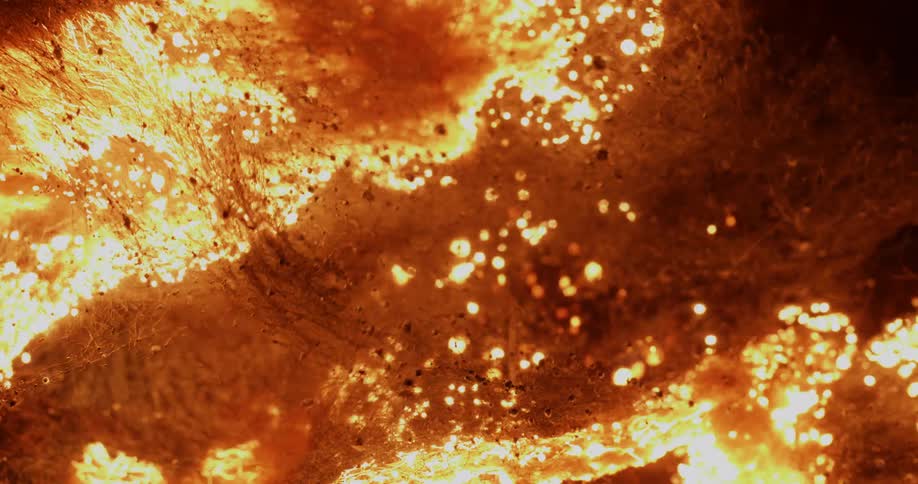 A fire is burning the fibers of some organic material