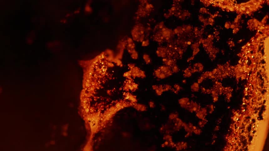 A glowing orange fire burns