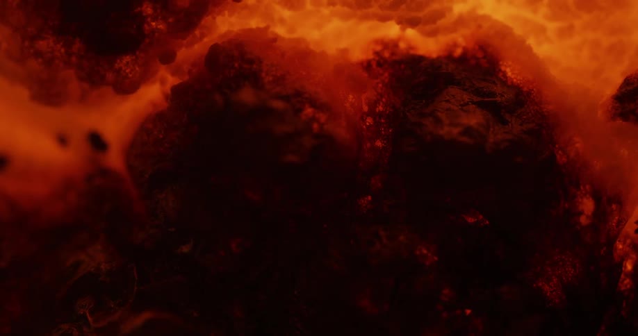 Orange and brown surface glows and expands as it heats