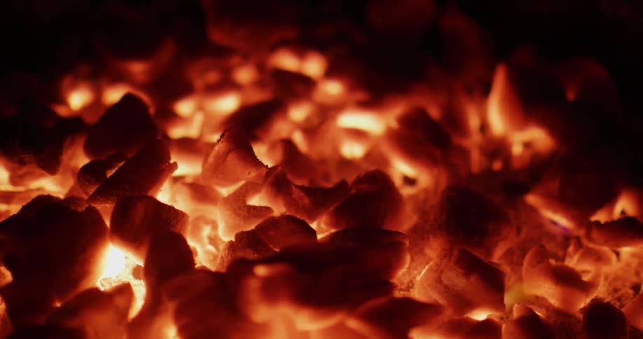 A fire burns red hot