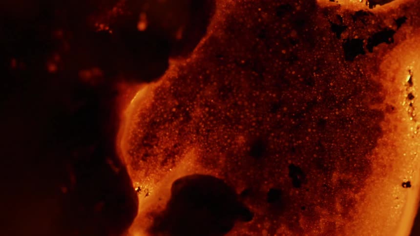 Hot lava bubbles and shimmers in the dark