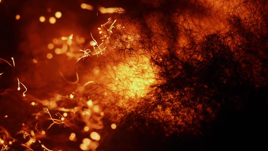 An orange glowing fire burns