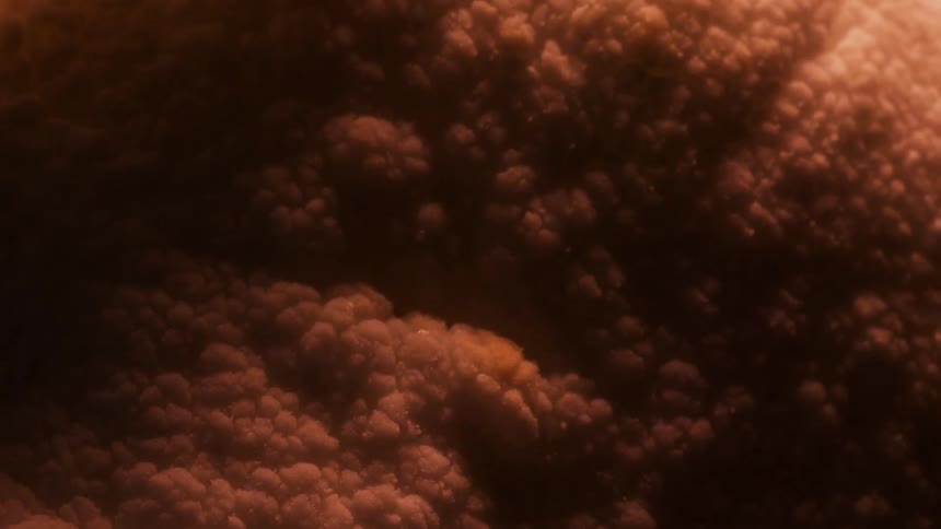 Foam grows and expands in the dark