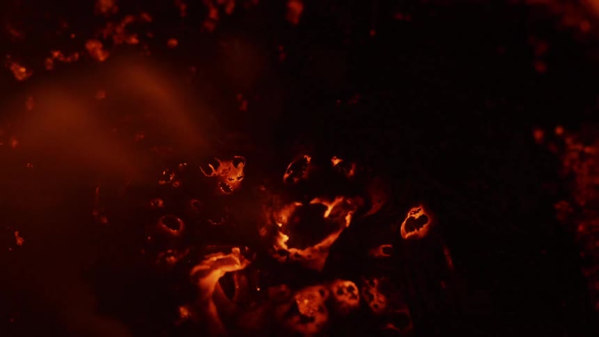 A fire burns red hot
