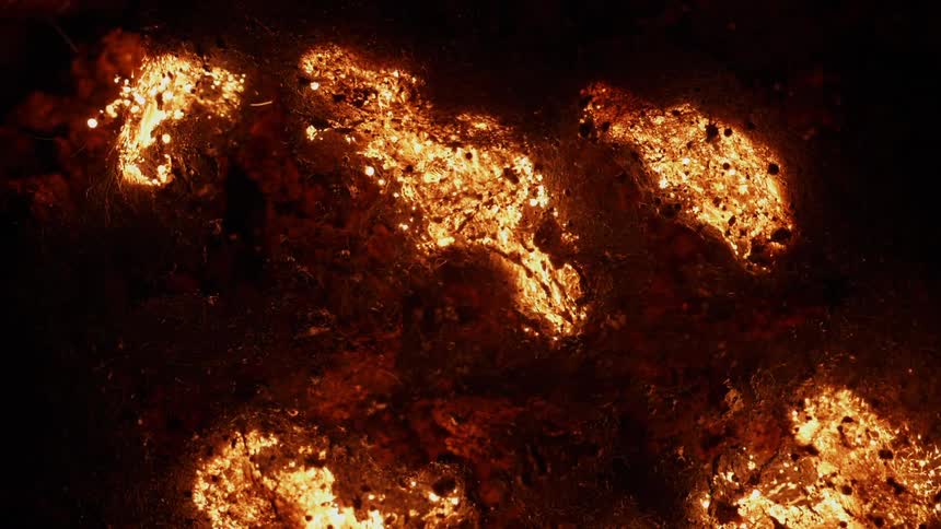 A fire burns up fibers
