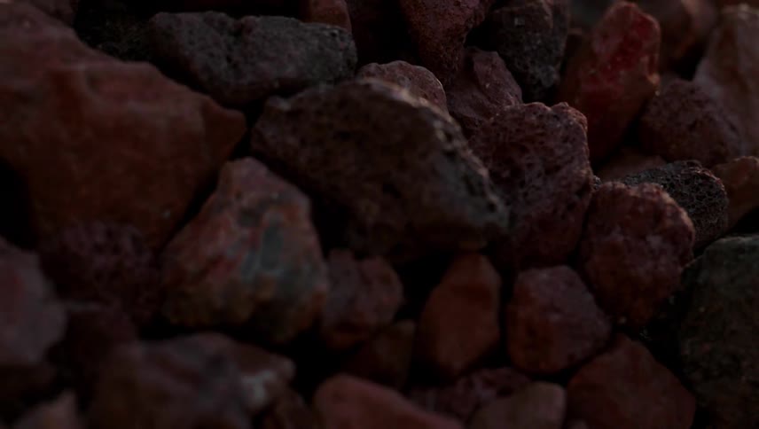 The group of rocks are rolling forward