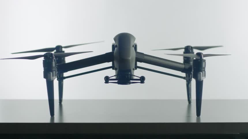 A stationary drone rises