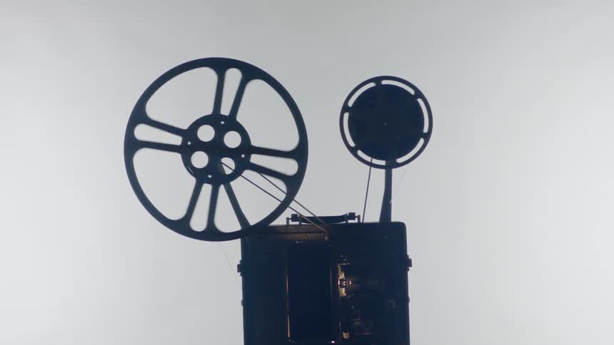 Old fashioned reel spins film