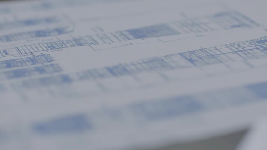 White paper with blueprints on it