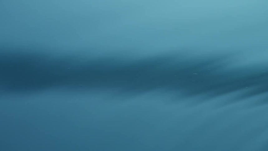 The dark water is giving waves of ripples